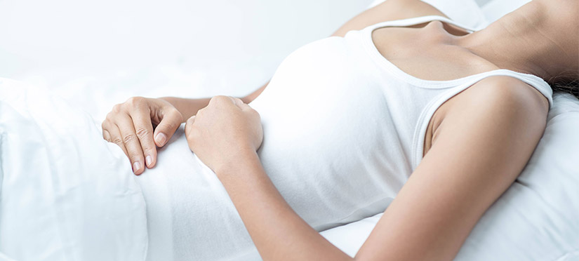 Боли внизу живота при беременности: причины и способы облегчения